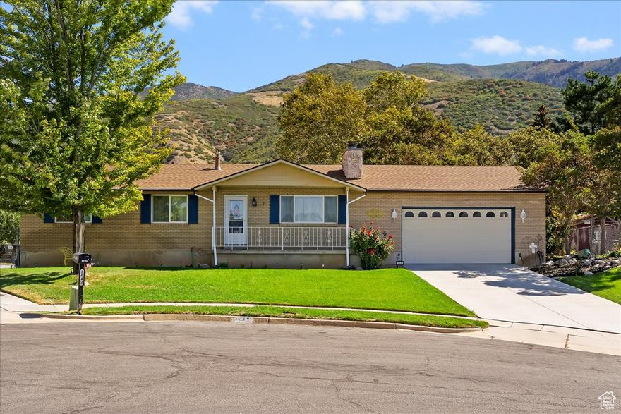 PRICE IMPROVEMENT!  SAVE $10,000.  SWIMMING ANYONE! This wonderful brick home includes an 18x36 absolutely beautiful HEATED swimming pool w/electric cover ready for you! Layton City Utah beauty! The yard is beautiful/well cared for with mountain views galore* You will feel like you are in the mountains! New pump & relay for secondary irrigation water* There is a covered deck to keep you cool in the summer & dry in the winter* 10x12 Shed* Inside the home is a formal living w/wood burning fireplace & formal dining (used to be bedroom/could switch back), Large kitchen w/brand new dishwasher (Oct 25) & nice dining leading to garage w/ample room for 2 cars plus all the workshop items* Garage has attic storage as well & a new driveway* Hall bath remodeled 2 yrs ago* Gorgeous laminate flooring in main areas* Awesome L shaped family room downstairs with built in cabinets, woodburning stove, 3/4 bath, 2 Bedrooms (one doesn't have a window) & craft room/den as well. All air vents were cleaned & an air purifier installed 2025.  All appliances stay! Tankless water heater 10 yrs, fridge 1 yr, windows installed 2010 ish* AND  soooo much more!   Call me for a private showing today!  Home is occupied! Please make an appointment (very easy to show)! This won't last long