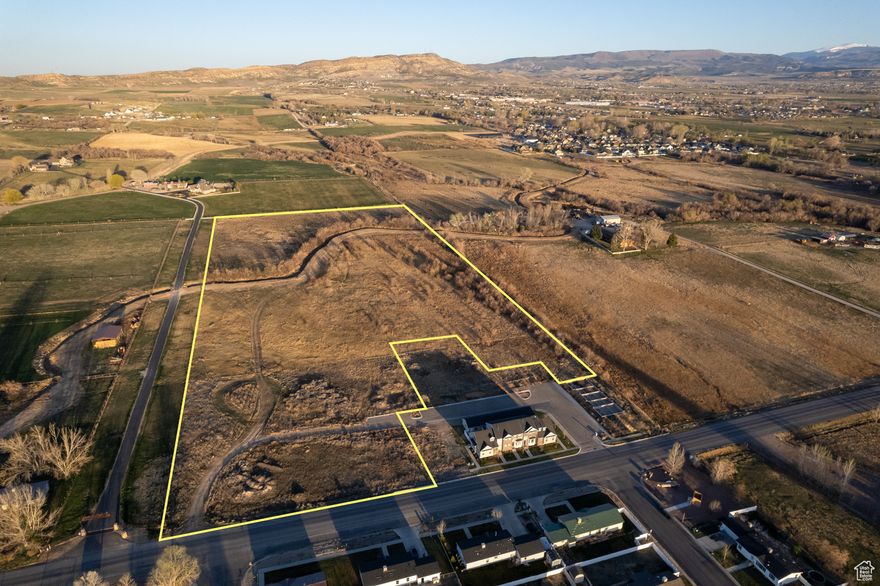 Development Opportunity! Just under 17 acres with water (1.5 shares Ashley Upper) ready to be developed. Site plans have already been completed, or start fresh with your own ideas. Zoned R-2, R-1, and RA-1. Taxes are based on Greenbelt; buyer to pay rollback taxes. Seller is a licensed Utah Realtor. Boundary photos in listing are an estimate only. Buyer to verify all information.