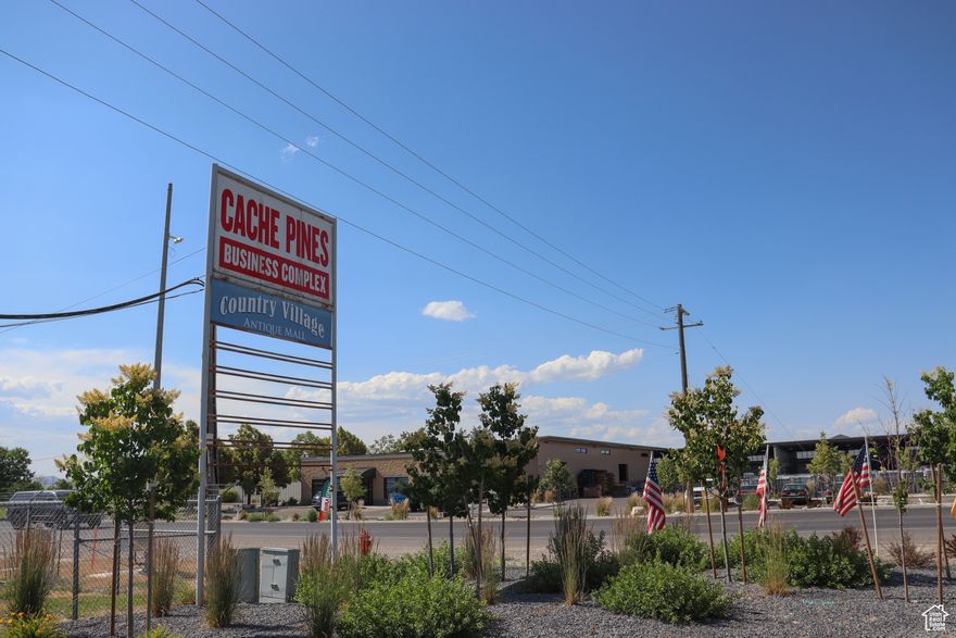 Industrial flex warehouse with 3 bays (East and West entrances), high ceilings, easy and varied access, plus ample parking.     Central and desirable location off of 200 N and near 1000 W, Logan.   Currently set up as a baseball/softball training facility with turf and cages.   Square footage figures are provided as a courtesy estimate only and were obtained from county records.  Buyer is advised to obtain an independent measurement. Listing agent is also of property.