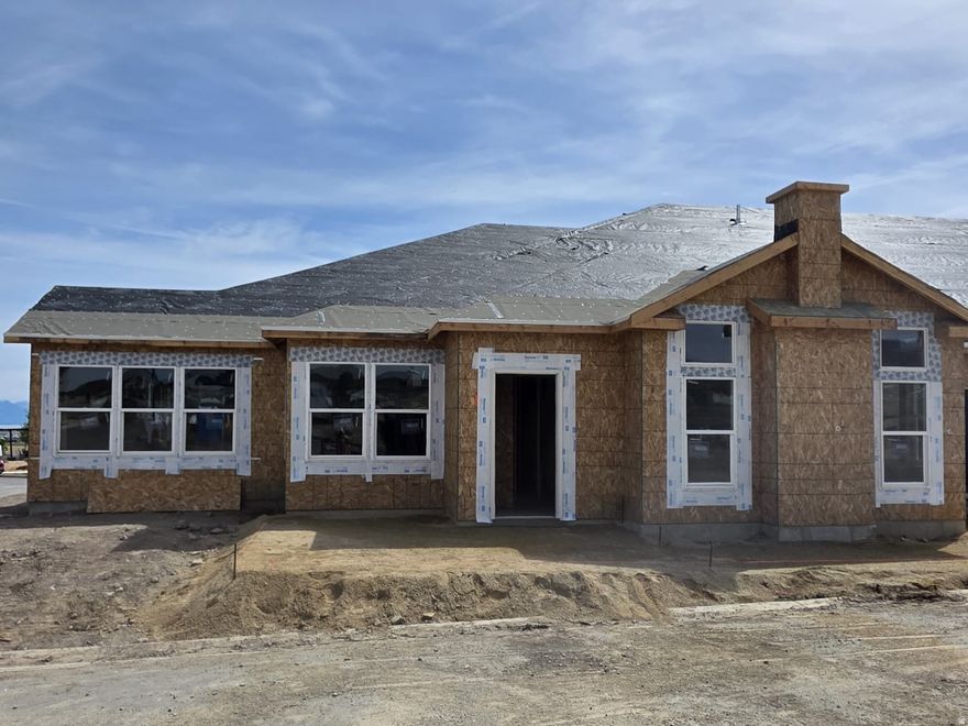 ***Estimated completion this summer!  Discover relaxed, low-maintenance living in this beautifully finished 3-bedroom, 2-bath home located in the center of Saratoga Springs' premier 55+ community. Designed with comfort and ease in mind, the single-level floor plan offers an open, airy layout filled with natural light and stylish modern finishes throughout.    At the heart of the home, the kitchen features elegant quartz countertops, contemporary cabinetry, and clean, modern details that make both everyday living and entertaining feel effortless. The versatile three-bedroom layout provides plenty of flexibility-perfect for visiting family, a hobby room, or a dedicated home office.    Ideally situated in vibrant Saratoga Springs, you'll enjoy quick access to shopping, dining, medical services, and outdoor recreation just minutes away. Within the community, neighbors connect easily and a welcoming, active lifestyle awaits.  If you're looking for a home that combines modern design, easy living, and a convenient location, this one is not to be missed.    Model Home Hours: Friday & Saturday, 12:003:00 PM  Call today to schedule your private tour and see it for yourself.