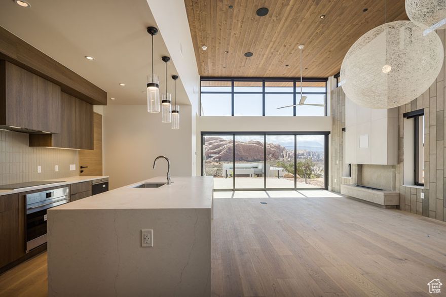 LIONSBACK RESORT  Incredible 2 Bedroom Casita with Expansive Views. This recently completed 2 Bedroom Casita at Lionsback Resort offers an unrivaled launchpad for all the adventure, exploration and relaxation Moab has to offer. This contemporary single level Strata Casita with its sophisticated design, immerses you in the surrounding desert landscape with both indoor and outdoor living. Floor to Ceiling windows accentuate the beautiful, tall, tongue and groove ceilings; and together they frame the desert landscape with incredible views of sunlight reflecting off red rock fins and the sunset alpenglow on the La Sal Mountains. Thoughtful design represents the surrounding terrain, all while incorporating high-end finishes, from Wolf and Subzero appliances to the modern spa-like wet room with soaking tub and Waterworks plumbing fixtures, to the built-in speaker system with Sonos amp. 2 en suite bedrooms, and nightly rental zoning makes this an ideal retreat to enjoy all that Moab has to offer, while still allowing rental income to offset costs. When the wild terrain is calling, Lionsback Resort offers on-site access to the Mill Creek Trail and Hells Revenge 4x4 trail, standing at the gateway of the world-renowned Sand Flats Recreation Area, home of the famous Slickrock Trail, two National Parks, Arches and Canyonlands, and the Colorado River for limitless discovery.