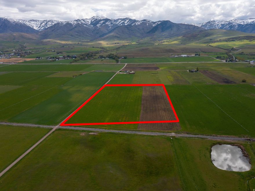 Peaceful 21.96 acre building lot offering the perfect blend of space, privacy, and usability. This property features valuable irrigation rights, making it ideal for hobby farming, livestock, or creating your own lush landscape. Enjoy wide-open views, fresh air, and plenty of room to build your dream home, shop, or barn.Could be subdivided into two building lots.