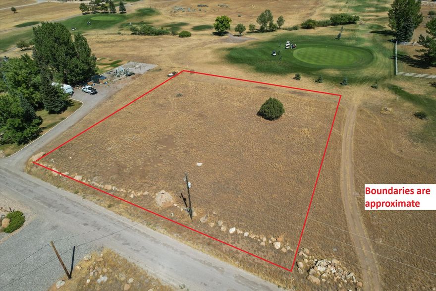 This exceptional building lot offers stunning views and a prime location adjacent to the golf course, making it the perfect setting for your dream home or getaway retreat. With year-round access, you can enjoy the beauty of every season with ease. Take advantage of the incredible resort amenities, including golf, swimming, and a variety of recreational opportunities designed for relaxation and enjoyment. Don't miss the chance to own a piece of this scenic and welcoming community.