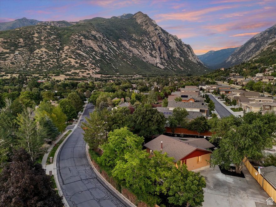 Nearly 1/3 acre flat lot with 360 degree views in the triangle. Just 8 miles to Snowbird and 24 minutes to SLC Airport.  There is a decent small house on site, tear it down for less than other lots in the area, or build on top / around / add on to it.  See attached survey.  Connections paid,  No HOA.  Owner/Broker.
