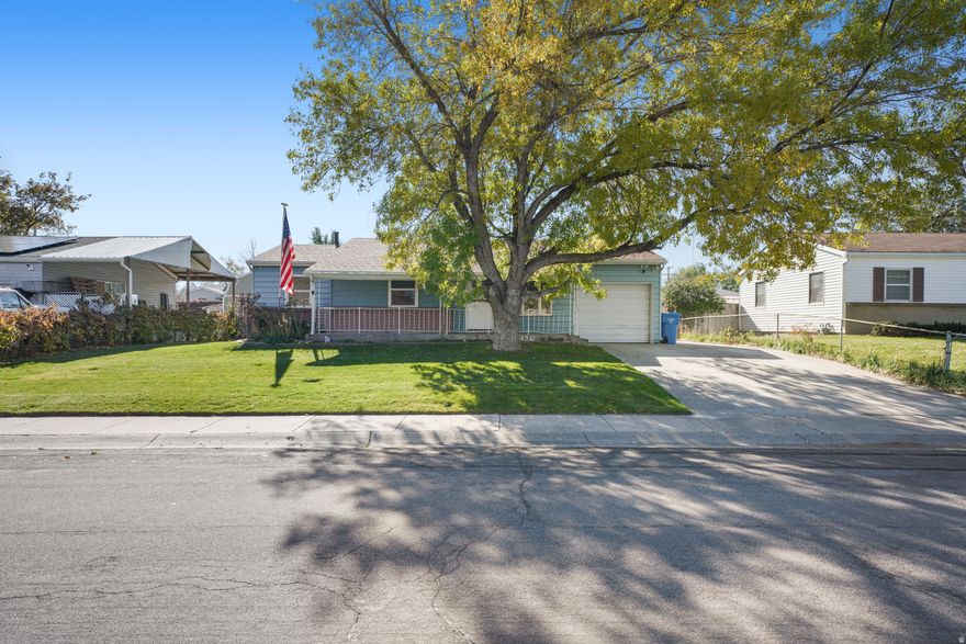 Great updated Rambler in Prime Location! Move-in ready 3-bed, 1-bath home with 1-car garage, 2-car carport, and extra parking. Features include new roof, fresh paint, new flooring, new stainless appliances, new fridge & dishwasher, new furnace, and smart garage opener with app control. Finished basement adds extra space. Easy to show-buyer to verify all info. See agent remarks for offer details..