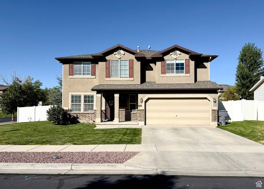 Welcome to this stunning 5 bedroom, 2.5 bathroom, corner lot home, where natural light fills every room. Facing east, the front offers beautiful mountain views, while the backyard provides spectacular west facing sunsets.  Inside you'll find a meticulously maintained open concept layout with newer laminate flooring, carpet and paint. The kitchen features stainless steel appliances. All 5 bedrooms are conveniently located upstairs. For year round comfort, a recently installed high efficiency HVAC system (2022 furnace and a/c) ensures the perfect temperature.  The fully fenced backyard is an entertainer's dream, featuring an in ground trampoline, a shed and a cement slab. The 2 car garage provides ample storage. This isn't just a house, it's the perfect place to make new memories.