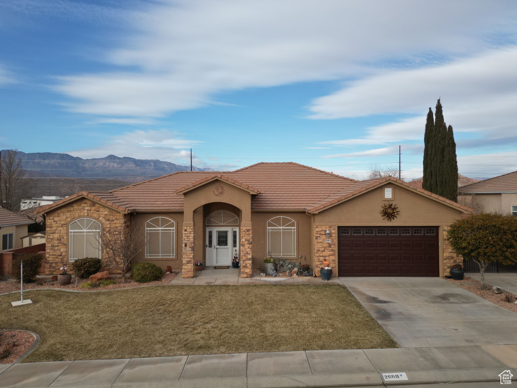 Discover comfort and convenience in this beautifully maintained 4-bedroom, 2-bathroom home in the heart of Hurricane, Utah! Spanning 2,165 sq. ft., this home features a spacious, open-concept family room and kitchen, perfect for entertaining.  Cozy up by the fireplace or relax in the large covered sunroom that offers year-round enjoyment. The fully fenced and landscaped yard provides privacy, while RV parking and a spacious 2-car garage with extra storage ensure plenty of room for all your needs. Ideally located just minutes from Sky Mountain Golf Club, and a short drive to Sand Hollow Reservoir and Zion National Park, this home is perfect for those who love the outdoors. Don't miss this incredible opportunity to live in one of Southern Utah's most desirable locations!   Square footage figures are provided as a courtesy estimate only and were obtained from county records .  Buyer is advised to obtain an independent measurement.