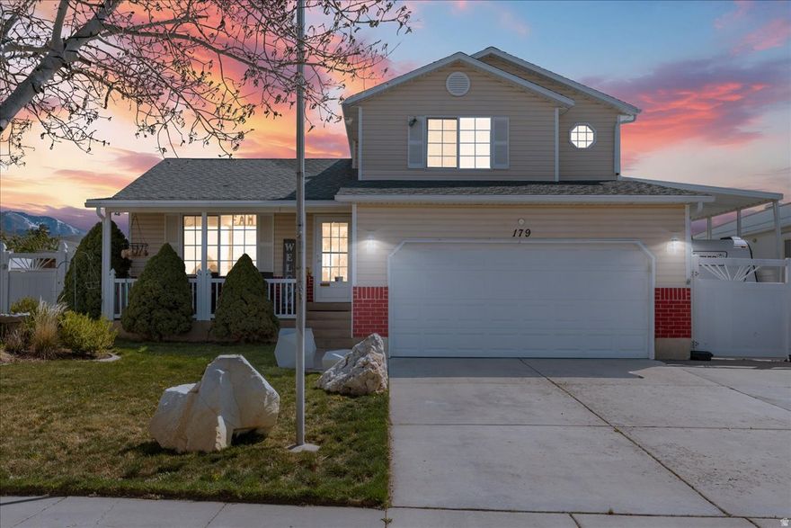 his beautifully updated 5 bedroom, 3 bathroom home in Tooele's Shetland Meadows neighborhood has everything you have been looking for and then some. From the moment you pull up, the charming curb appeal, mature landscaping, and welcoming covered front porch set the tone for what's inside. The main level features fresh LVP flooring throughout, a fully updated kitchen with quartz countertops, stainless steel appliances, and a gas range, plus a bright dining area with vaulted ceilings and stunning mountain views right out the window. Two separate living spaces give everyone room to spread out, and the cozy electric fireplace makes the lower family room the perfect place to unwind. The primary bedroom is spacious and comfortable, and the additional bedrooms offer flexibility for family, guests, or a home office. The convenient main level laundry room adds everyday ease you will appreciate. Step outside and you will fall in love with the backyard. The oversized covered patio with string lights is made for summer evenings and weekend gatherings. The fully fenced yard, storage shed, and raised garden bed round out a space that truly functions as an outdoor extension of the home. For anyone with toys, this property is a dream. The covered RV pad with gated access, 2 car garage, and 2 car carport mean you will never run out of room for your trailer, boat, or extra vehicles. No HOA means no restrictions on how you enjoy it all. And the views? Breathtaking. Stunning mountain backdrops surround you on every side, and sweeping Great Salt Lake vistas remind you exactly why people love calling Tooele Valley home. Tooele is one of Utah's fastest growing and most exciting communities, and the timing to buy here has never been better. The brand new Founders Pointe retail center at 1000 North Main Street has completely transformed the city's shopping and dining scene, bringing in Chipotle, Wingstop, Chili's, Hobby Lobby, Ulta Beauty, Ross, Five Below, Sierra, Bath and Body Works, and TJ Maxx all in one convenient location. Founders Pointe attracted nearly a million visitors within its first two months of opening, ranking it among the top 50 neighborhood retail centers in the entire nation. And the growth is not slowing down. A brand new Smith's Marketplace recently opened at 2400 North along with Beans and Brews, Einstein Bagels, and Jersey Mike's Subs nearby. On top of that, developer Cole West has announced Echo, a 1,260 home master planned community coming to Erda with single family homes, townhomes, open space, and community amenities, further cementing Tooele Valley as one of Utah's most dynamic growth corridors. All of this, just 30 miles from Salt Lake City, with mountain views, no HOA, and room for all your toys. This one checks every box. Come see it in person and you will understand why homes like this do not last long.