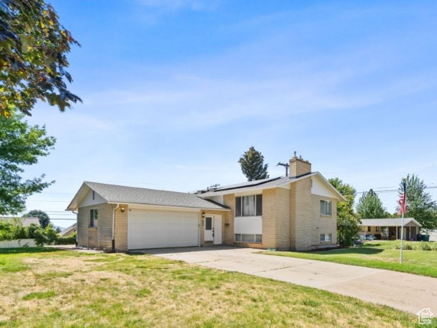 Welcome to your dream home in one of Kaysville's most desirable neighborhoods!  This spacious residence offers an inviting, open kitchen with a sliding glass door leading to a deck where you can take in breathtaking Wasatch Mountain views. The large backyard is perfect for entertaining, gardening, or simply relaxing in your own private outdoor space. A separate basement entrance provides flexibility for a potential tenant, guest suite, or home office. Inside, enjoy energy savings year-round with owned solar panels, and cozy up to not one but two stunning fireplaces; a rock gas fireplace upstairs for charm and warmth, and a brick gas fireplace downstairs for a welcoming, rustic feel. Enjoy unbeatable access to outdoor recreation, including hiking and biking trails, premier skiing, and nearby parks. Commuting is a breeze with easy access to Hwy-89, Lagoon, and the Salt Lake City International Airport. Don't miss the chance to own this versatile, well-located home-perfect for both living and investing!