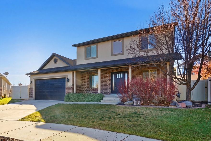 This beautiful home shows like a 10! Meticulously cared for and recently remodeled, it reflects pride of ownership inside and out. Perfectly positioned just outside of Daybreak, you'll enjoy all the perks of the area without the high monthly fees-only a low $290 annual HOA. With easy access to Bangerter Highway and Mountain View Corridor, getting anywhere in the valley is quick and convenient. Step outside to a beautifully designed, low-maintenance backyard featuring irrigation and raised garden boxes. The private, terraced yard creates a peaceful green retreat and backs directly to the Welby Jacobs Canal Trail, with trail access just around the corner-ideal for walks, biking, or evening strolls. Nearby, you'll find popular destinations like The District, Soda Row, Daybreak Lake, along with numerous parks, restaurants, and shopping options. Inside, enjoy a finished basement with thoughtfully upgraded features including three-tone paint, custom trim work, roller shades, and a beautifully updated primary bathroom-adding both style and comfort throughout the home. Square footage figures provided as courtesy estimate only and obtained from previous mls lsiting.  Buyer & agent to verify all info