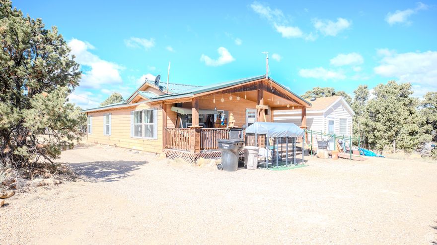 Wide Open Spaces an Outdoorsman's Dream! This remote property is located between Strawberry Reservoir and Starvation Reservoir. It has easy access off Highway 40 for year round access. 5.78 acres of solitude! very wooded with Juniper, Pinion and trails throughout. A water well on the property so no hauling water on this property. The cute open floor plan Home has 2 bedroom 2 bath, newer flooring and paint. There is a Large Quonset hut, perfect for storing all your toys and equipment. The large "She Shed" next to the home would make a great guest quarters or use as an office, home business. There are multiple out buildings, Chicken coops, Workshops, Camp trailer with additional sleeping place attached. Plenty of RV parking spots for family and friends to come and visit. This one is a must see, call for an appointment.