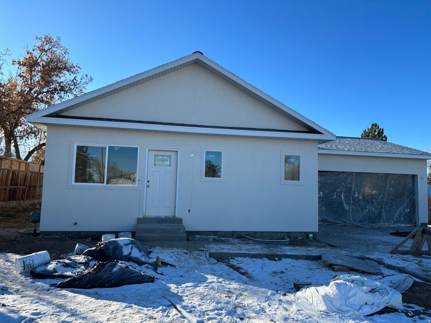 Beautiful new construction home in Mt. Pleasant! This 2,200 sq ft home with 2 bedrooms and 2 bathrooms sits on a spacious .25 acre lot and features a bright, open floor plan with fresh finishes throughout. Enjoy a blend of comfort and durability with carpet and laminate flooring, paired with modern design and plenty of natural light. A great opportunity to own a brand-new home in a charming community - schedule your showing today! Basement will be unfinished, with a walkout making this perfect to put a basment apartment in and cut your mortgage in half! extra large 2 car garage, RV Parking, secondary water for the yard, this new construction home will be complete late 2025, early 2026!