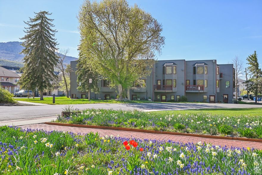 This 2-bedroom, 2-bathroom townhome at 1378 Park Avenue offers an incredible location in the heart of Park City. With 1,440 sq ft of living space, it sits at the entrance to City Park - home to grassy fields, tennis & basketball courts, a playground, sand volleyball courts, and a skate park. Enjoy walkability to Historic Main Street, slopes of Park City Mountain Resort, bike/hike trails, shopping, dining, and events, plus direct access to Park City's free transit route for easy transportation year-round.   The home features beautiful ski resort views and is part of a small, well-maintained community of just eight residences. Owners and guests share access to a spacious deck with a large hot tub, perfect for aprs-ski relaxation or summer evenings. Inside, the traditional layout includes defined living areas and timeless, well-kept finishes. A private in-unit sauna adds a cozy and desirable amenity - ideal for unwinding after a day on the mountain.   Additional highlights include generous storage space and a dedicated parking spot in a secure community garage. With nightly rentals allowed and a premier spot along Park City's popular Fourth of July Parade route, this property is an exceptional opportunity for short-term rental income, a seasonal retreat, or long-term family asset.