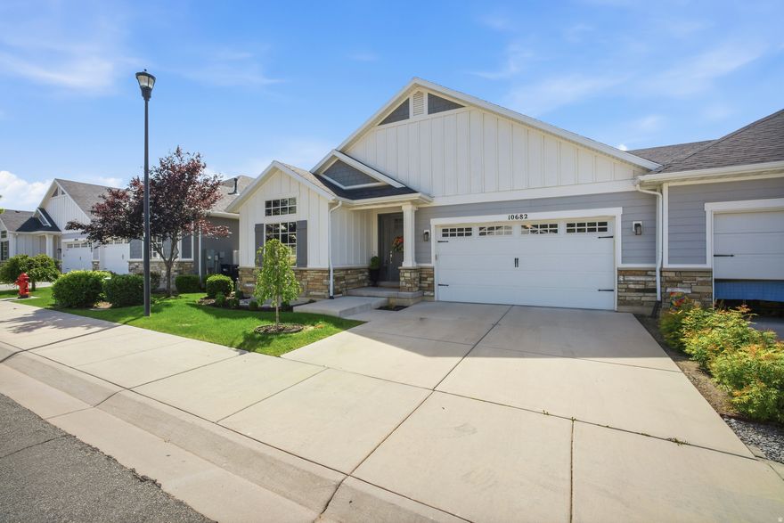 Rarely available property in a very sought after neighborhood in Sandy.  Open floor plan with main floor primary bedroom/bathroom, vaulted ceilings; finished basement with large den/family room and french doors leading to fenced back yard.  Double garage