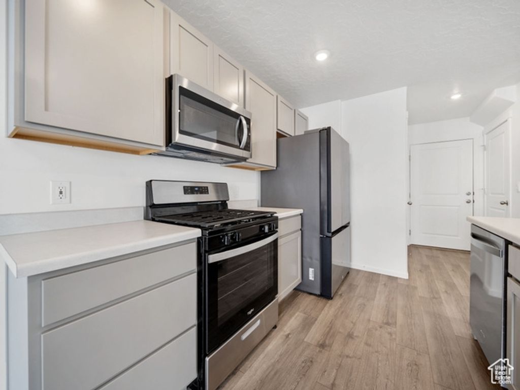 Photo of 1833 N BLUE IRIS AVE #1073, Tooele, UT 84074 (MLS # 2119504)