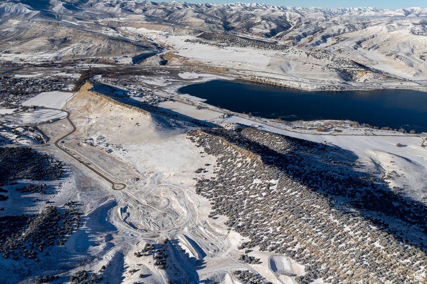 Situated in the heart of Coalville, this remarkable 48-acre property offers endless possibilities for development. Zoned for light commercial use, it comes equipped with water, electricity, and public sewage at the street, as well as two convenient access points for fire services. With stunning views and ample room for expansion, this property is a rare find in a growing area. Perfectly located just 25 minutes from Park City and 55 minutes from Salt Lake City, it offers easy access to world-class amenities while maintaining the charm of small-town living. Outdoor enthusiasts will love being just minutes away from Echo Reservoir and Rockport Reservoir, making this an ideal location for those seeking both opportunity and adventure. Don't miss your chance to shape the future of this prime Coalville property!