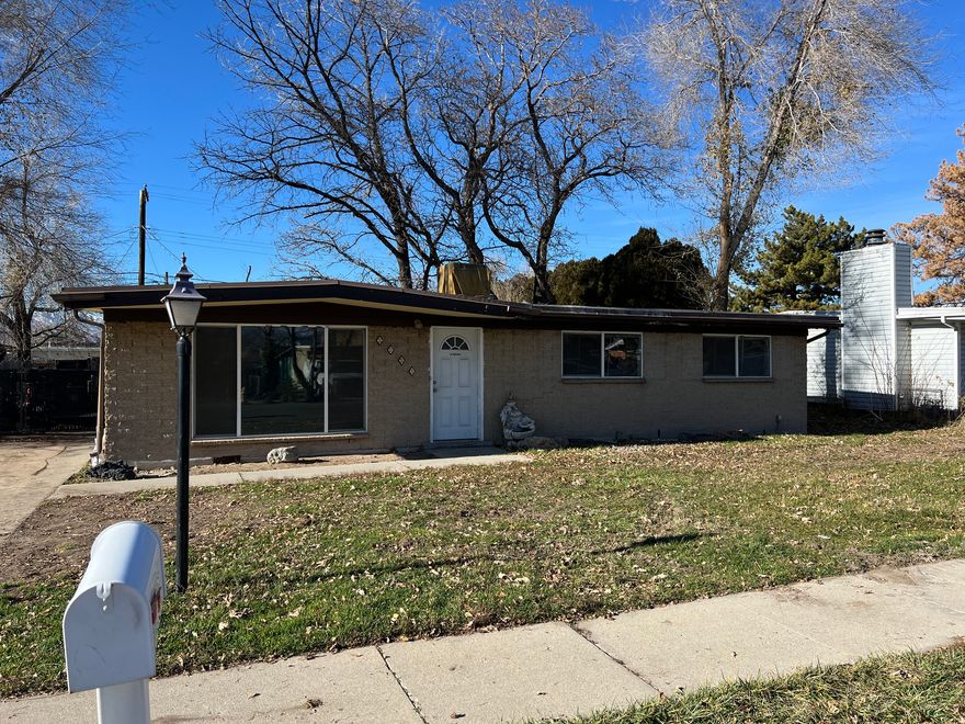 Good location. Close to shopping, Bangerter and the Maverick Center. Home needs tender loving care. Nice private backyard, fully fenced. Extra storage in the back a small add-on and a shed. Hardwood floor. Measurements a courtesy buyer to verify.