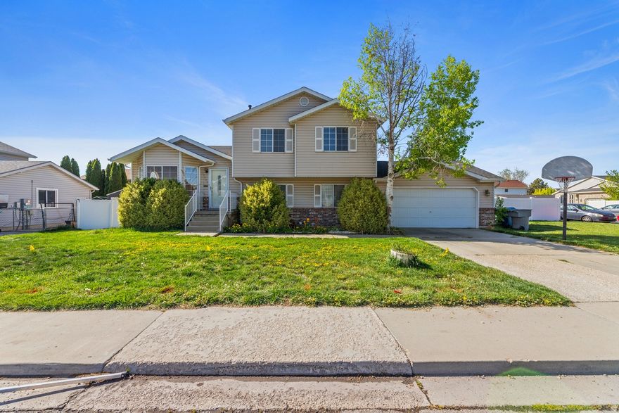 OPEN HOUSE SATURDAY THE 2ND FROM 12pm2pm! Tri-level home in an unbeatable location! Nestled just far enough from Highway 89 to enjoy peace and quiet, yet close enough for quick access to shopping, dining, and daily conveniences, this home truly offers the best of both worlds. Conveniently located just down the street from the elementary school, it's perfectly situated for everyday ease. Inside, you'll find 3 bedrooms, a spacious kitchen and dining area ideal for gathering, and a large family room with plenty of room to relax. A huge mudroom/flex space adds versatility for storage, hobbies, or additional living needs. Outside, the well-maintained backyard is perfect for entertaining or enjoying the outdoors, and the side street access offers potential RV parking. With major updates already completed, including a new water heater, HVAC system, and water softener, this move-in ready home is an excellent opportunity for first-time buyers or anyone looking for comfort, convenience, and a new place to call home. *Square footage figures are provided as a courtesy estimate only and were obtained from the previous MLS listing.  Buyer is advised to obtain an independent measurement.*