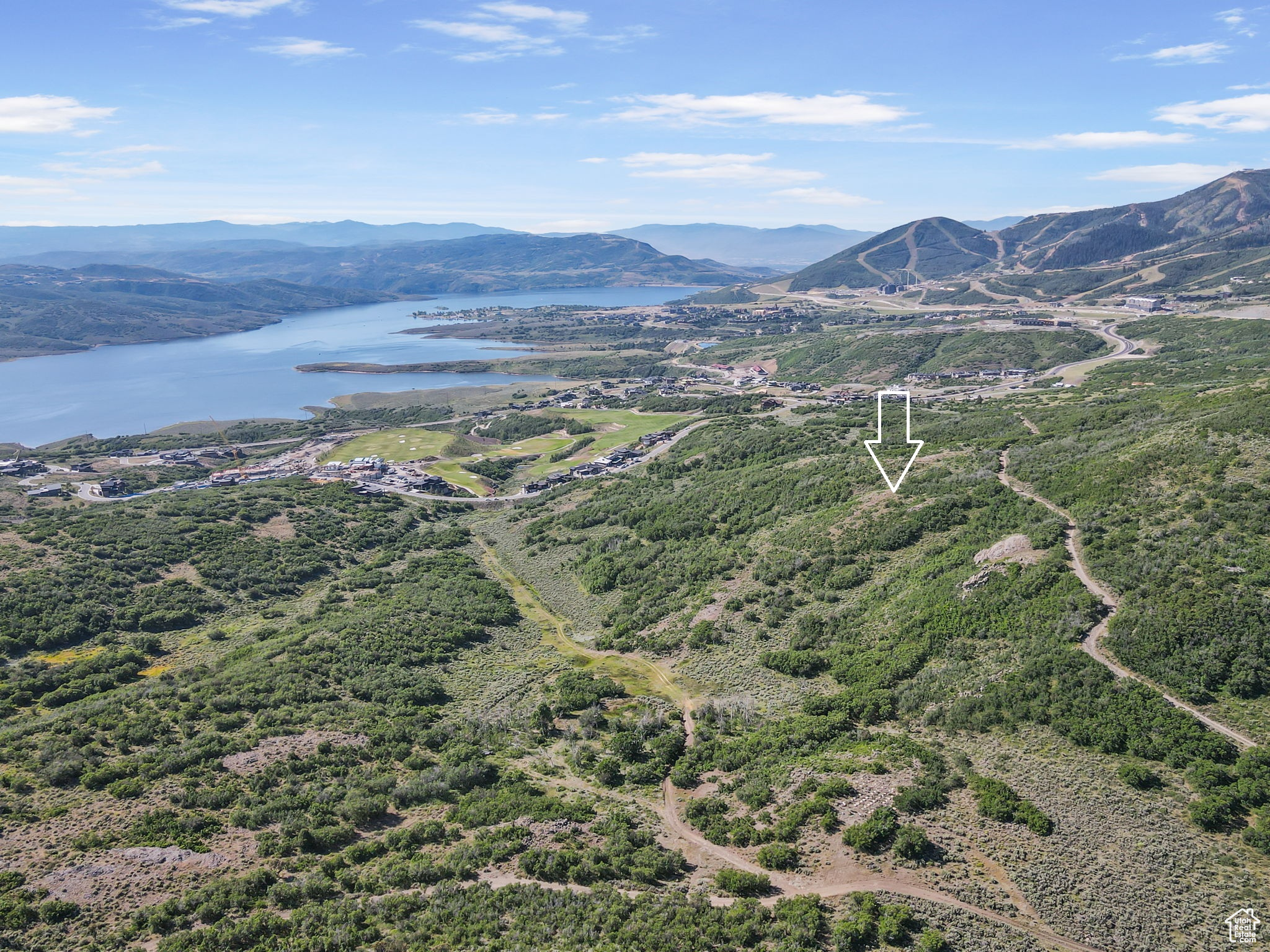 This 1 acre property offers stunning views of Jordanelle Reservoir and the Wasatch Mountains. Discover the convenience of being within minutes from Deer Valley and Park City Resort, Tiger Woods designed Marcella Club golf course and other exciting outdoor adventures. Reach the Deer Valley Jordanelle Express Gondola in less than 5 minutes, granting you access to world-class skiing and mountain adventures. Heber City and Park City are a quick 10-minute drive away, providing a wealth of dining, shopping, and entertainment options. If you like to go golfing, hiking, fishing, biking, camping, horse back riding, snow mobiling or skiing then you will be in a prime location, close to all of your favorite outdoor adventures. The Salt Lake International Airport is approximately 45 min away or fly in privately to the Heber Valley Airport which is 20 min away. Purchase this lot as a perfect investment for a future dream home at a fraction of the cost of current developed lots nearby. This lot does come with 1 JSSD ERU. The buildable area is just over .33 acres. Buyer/Buyers agent to verify all information. Lot lines are approximate. Be sure to check out the video attached to get a bird's eye view!