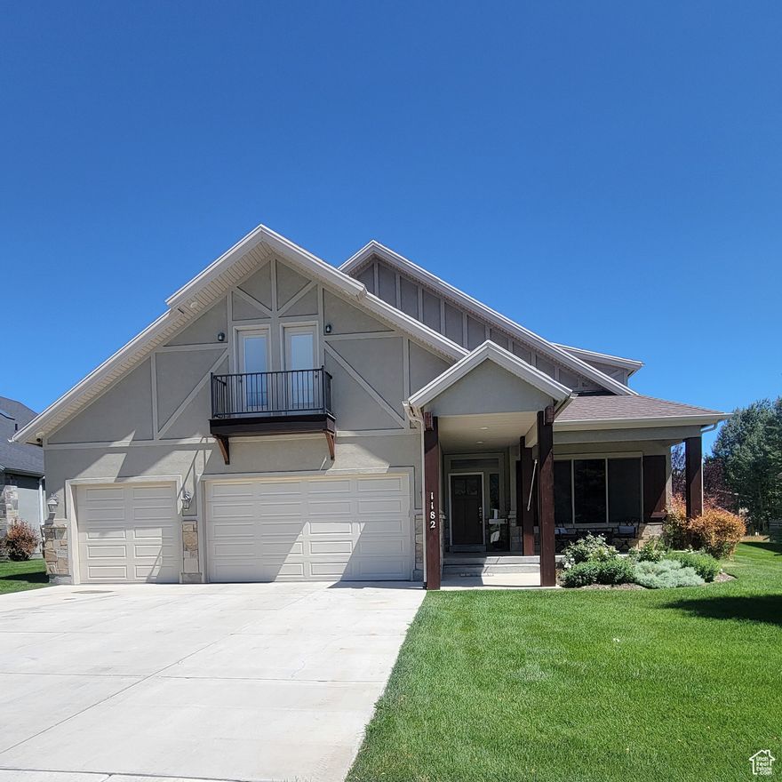 Step into comfort and style with this beautiful home in Midway. The main level features two bedrooms, including a master suite, a second full bathroom with a convenient storage closet, a large laundry room, and an open-concept living area anchored by a stunning brick fireplace. The modern kitchen boasts a 5-burner gas range, double wall ovens, quartz countertops, soft-close cabinetry, and a walk-in pantry. Upstairs, you'll find three additional bedrooms-including a second master suite-a fourth bathroom with extra storage, a cozy family room, and ample space for all your needs. Enjoy outdoor living with permanent exterior lighting, balconies at the front and back, a large patio with a hot tub, and a spacious 3-car heated garage. Located just minutes from Park City and various recreational hot spots. This home is a must-see. Owner/Agent.