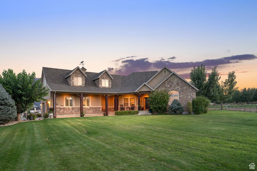 This property offers five flat acres and everything a horse owner or rodeo enthusiast could want!  The grounds feature a one acre animal pasture, a full size 150 x 250 roping arena, and a lit 120 x 160 riding arena for evening practice. The 80 x 40 horse barn includes automatic water heaters, electricity, and a walk in tack room along with ten stalls, six inside and four outside. There is also a 14 x 41 hay barn and a 36 x 30 shop perfect for equipment, trailers, or toys. The home itself has been kept in pristine condition and offers thoughtful details throughout such as plantation shutters, a theater room, a walkout basement with kitchenette, and a mother in law apartment upstairs complete with separate water heater and AC. From the back porch you can enjoy sweeping views of the valley while still being tucked at the edge of a quiet neighborhood. This rare property blends functionality, comfort, and beauty into the perfect equestrian retreat!  Call today for a private tour!