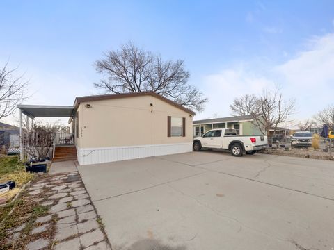 Photo of 7032 W APALOOSA DR #24, West Valley City, UT 84128 (MLS # 2132157)