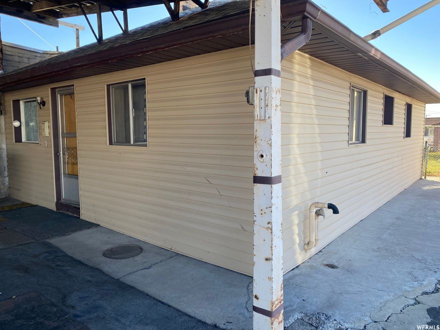 The property features 1 attached warehouse and 1 detached garage with large paved parking lot. Attached warehouse has sq ft: 2350 main level and 2349 basement level. Attached garage has a 1/2 bathroom, office space and gas heat. Attached garage has basement access via cellar door in floor. Detached garage has 110 & 220 power as well as a coal furnace, located at north end of parking lot. House has a great room with fireplace and separate living room. Finished bonus room in basement. Square footage figures are provided as a courtesy estimate only and were obtained from tax roll, 2025 survey and appraisal. Buyer is advised to obtain an independent measurement. Buyer to verify all listing information.