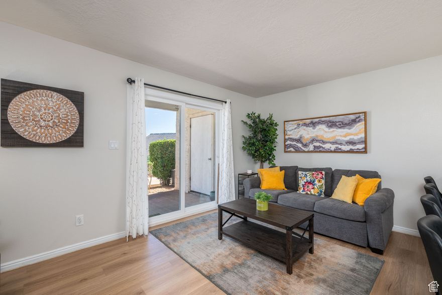 This beautifully updated 1-bedroom, 1-bath first-floor condo is truly move-in ready and packed with upgrades. Enjoy brand new laminate flooring, fresh paint, new cabinets, countertops, kitchen sink, and a fully renovated bathroom - all designed for modern comfort and style. The unit was re-piped just two years ago for peace of mind, and it includes a new washer and dryer. The kitchen appliances were replaced just three years ago, and the cozy living area features a sleeper sofa, making it perfect for guests. With breathtaking views of Snow Canyon and the West Valley, this condo is an ideal choice for a personal getaway, second home, or entry-level vacation rental opportunity. All information deemed liable but not guaranteed. Buyer and buyer agent to verify.