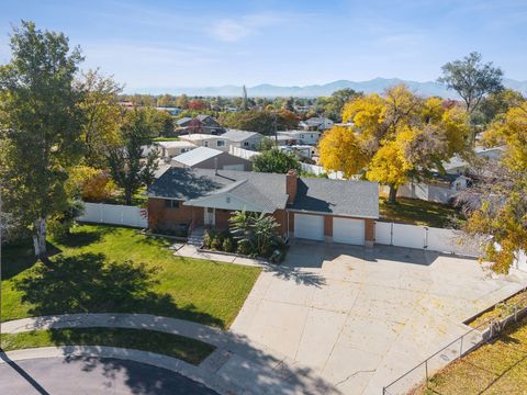 Photo of 3896 S CAMPFIRE CIR W, West Valley City, UT 84119 (MLS # 2128350)