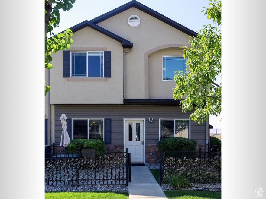 Welcome to this beautifully maintained end-unit townhome in Bridgerland Meadows-one of Logan's most desirable communities! With 3 bedrooms, 2.5 bathrooms, and brand-new carpet throughout, this bright and spacious home is truly move-in ready. The end-unit location offers added privacy and extra windows, filling the home with natural light. On the main floor, enjoy an open-concept layout that seamlessly connects the kitchen, dining, and living areas-ideal for both daily living and entertaining. Upstairs, the large primary suite features a private bathroom and generous closet space. Two additional bedrooms and a full bath complete the upper level. Other highlights include a 2-car garage, private patio, and a fantastic location just minutes from parks, schools, shopping, and Utah State University. Whether you're a first-time buyer, investor, or looking to downsize, this home checks all the boxes!