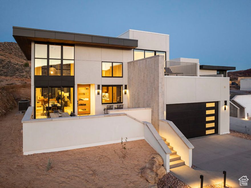 Lionsback Resort offers an unrivaled launchpad for all the adventure, exploration and relaxation Moab has to offer, all while treading lightly on the land. While its 175 acres of land with 70% open space offer a sense of seclusion, Lionsback Resort is a stone's throw away from the City of Moab, so you're never far from community and culture. This contemporary 2 story Mesa Casita meets sophisticated design, immersing you in the surrounding desert landscape with both indoor and outdoor living, creating the epitome of open concept living. Grand spaces with vaulted ceilings framing the desert landscape with floor-to-ceiling windows provide you the unobstructed views of sunlight reflecting off red rock fins and the sunset alpenglow on the La Sal Mountains. The fireplace features a limestone hearth, offering a more intimate ambiance for cooler desert evenings. Earthy desert hues from the Fireclay tile backsplash and Italian cabinets are beautifully offset by clean, modern lines from the timeless quartz countertops. Thoughtful design represents the surrounding terrain, all while incorporating high-end finishes, from Wolf and Subzero appliances to a 5-piece spa-like bathroom with wet room, soaking tub and Waterworks plumbing fixtures, to the built-in speaker system with Sonos amp. Offering 3 en suite bedrooms, this luxury home has short-term rental zoning and now the price includes a turnkey furniture and houseware package. When the wild terrain is calling, Lionsback Resort offers on-site access to the Mill Creek Trail and Hells Revenge 4x4 trail, standing at the gateway of the world-renowned Sand Flats Recreation Area, home of the famous Slickrock Trail, two National Parks, Arches and Canyonlands, and the Colorado River for limitless discovery.