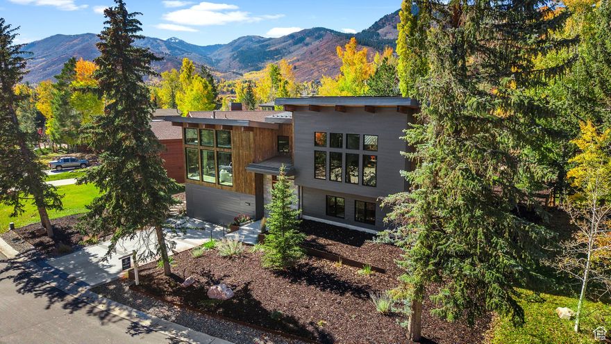 Reimagining Mountain Modern: A Park Meadows Masterpiece in the heart of Park Meadows, one of Park City's most coveted neighborhoods, this architectural masterpiece captures the essence of modern mountain living. Designed and built by Alpine Design Build and architecture by Farrell Architects. The 4,300+ sq. ft. home transforms a 1980s split-level into a stunning retreat that perfectly balances warmth, craftsmanship, and contemporary design. Expansive windows frame mountain views, while open living spaces and private bedroom suites invite both gathering and relaxation.  Powered by sunlight, the home's solar technology fuels heating, cooling, lighting, and even dual EV charging-an impressive example of sustainable luxury. Natural materials and refined finishes nod to Park City's rugged heritage while embracing a timeless modern aesthetic. Featured in the 2023 Park City Showcase of Homes, this residence stands as a testament to thoughtful design and innovative building. With world-class skiing, scenic trails, Park Meadows Country Club, and Main Street dining just minutes away, this home offers the ultimate in Park City living.