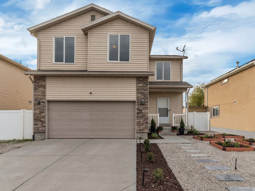 RARE NEWER (2005) TURN-KEY HOME, FINISHED 2-CAR GARAGE (EV CHARGER) NO HOA,  LOW MAINTENANCE XERISCAPED YARD, FULLY FENCED, TREX DECK+ SHED W/LOFT, ONLY MINUTES TO DOWNTOWN AND AIRPORT.  Well-maintained, turn-key home built in 2005; featuring a functional 3 bedroom, 2.5 bath layout designed for comfortable everyday living. The home offers an open living space with great natural light, efficient use of space, and low-maintenance living throughout. The fully finished 2-car garage is EV-charger ready and includes custom shelving and cabinetry for exceptional storage and convenience. Great location with convenient  freeway access for an easy commute to downtown Salt Lake City and the airport, excellent accessibility to  major commuter routes; TRAX and public transit. No HOA means more freedom: no monthly fees and fewer restrictions. The low maintenance fully fenced yard features xeriscape landscaping, artificial turf, and over-sized west-facing Trex deck to enjoy beautiful Utah sunsets.  A fully built-out storage shed with loft for storage, hobbies or a flexible use space. This yard provides a space to relax, garden, or entertain while keeping maintenance simple and manageable. Whether you're looking for move-in-ready convenience, practical living space, and commuter accessibility, THIS HOME CHECKS ALL THE BOXES. Buyer to verify all information contained in listing including SF, which all are provided for buyer's convenience.