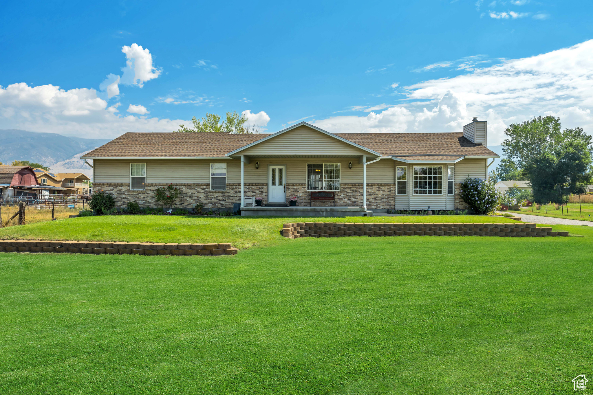 Charming West Bountiful Rambler on 2 Acres-Horse Property! Welcome to this inviting and beautifully maintained rambler nestled in the heart of West Bountiful. Situated on a rare 2-acre lot, this property offers the perfect blend of comfort, space, and functionality - ideal for those seeking a peaceful lifestyle with room to roam. Property features outbuildings and plenty of space for animals, toys, or hobbies. Inside, you'll find warm and welcoming living spaces filled with natural light and timeless charm. Solid construction with 2x6 framing along with a concrete crawl space which is ideal for extra storage. Step outside to enjoy the expansive deck, perfect for entertaining, relaxing, or taking in the stunning mountain and pasture views. The property also features a large 3-car detached garage, multiple outbuildings, RV dump and endless possibilities for your dream outdoor setup, whether it's a garden, workshop, or additional storage. Don't miss this rare opportunity to own acreage in a prime location, with the serenity of country living and convenient access to nearby amenities.