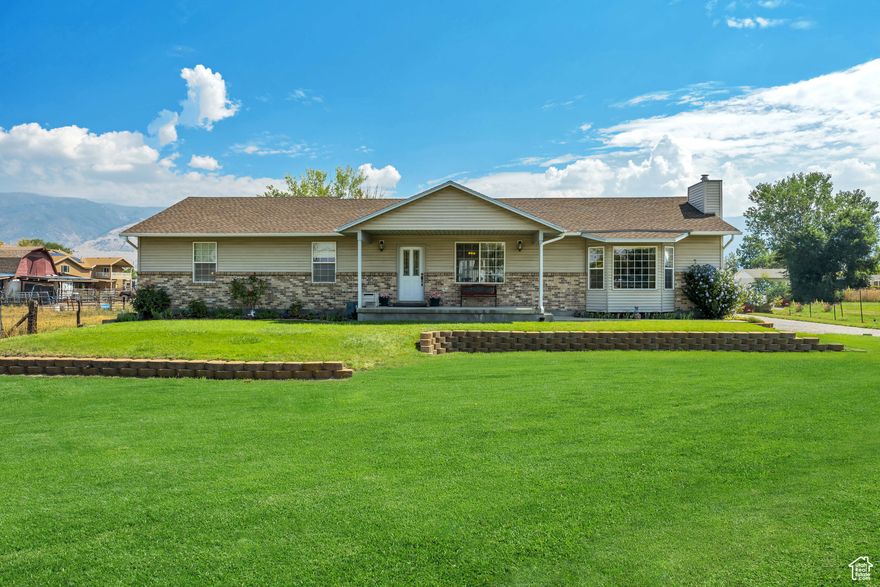 Charming West Bountiful Rambler on 2 Acres-Horse Property! Welcome to this inviting and beautifully maintained rambler nestled in the heart of West Bountiful. Situated on a rare 2-acre lot, this property offers the perfect blend of comfort, space, and functionality - ideal for those seeking a peaceful lifestyle with room to roam. Property features outbuildings and plenty of space for animals, toys, or hobbies. Inside, you'll find warm and welcoming living spaces filled with natural light and timeless charm. Solid construction with 2x6 framing along with a concrete crawl space which is ideal for extra storage. Step outside to enjoy the expansive deck, perfect for entertaining, relaxing, or taking in the stunning mountain and pasture views. The property also features a large 3-car detached garage, multiple outbuildings, RV dump and endless possibilities for your dream outdoor setup, whether it's a garden, workshop, or additional storage. Don't miss this rare opportunity to own acreage in a prime location, with the serenity of country living and convenient access to nearby amenities.