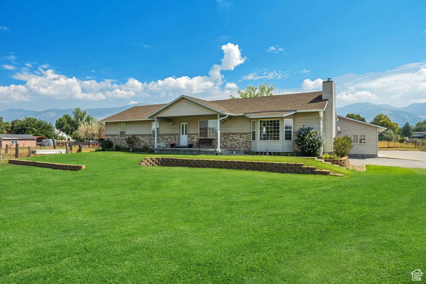 ~MAJOR PRICE REDUCTION~ on this 2 Acre-Horse Property w/buildable lot! Welcome to this beautifully maintained rambler nestled in the heart of West Bountiful. Situated on a rare 2-acre lot, this property offers the perfect blend of comfort, space, and functionality.  Inside, you'll find warm and welcoming living spaces filled with natural light and timeless charm. Solid construction with 2x6 framing along with a concrete crawl space which is ideal for extra storage. Step outside to enjoy the expansive deck, perfect for entertaining, relaxing, or taking in the stunning mountain and pasture views. The property also features a large 3-car detached garage, heated Quonset, covered RV port w/RV dump with endless possibilities for your dream outdoor setup, whether it's a garden, workshop, or additional storage. Don't miss this rare opportunity to own acreage in a prime location.