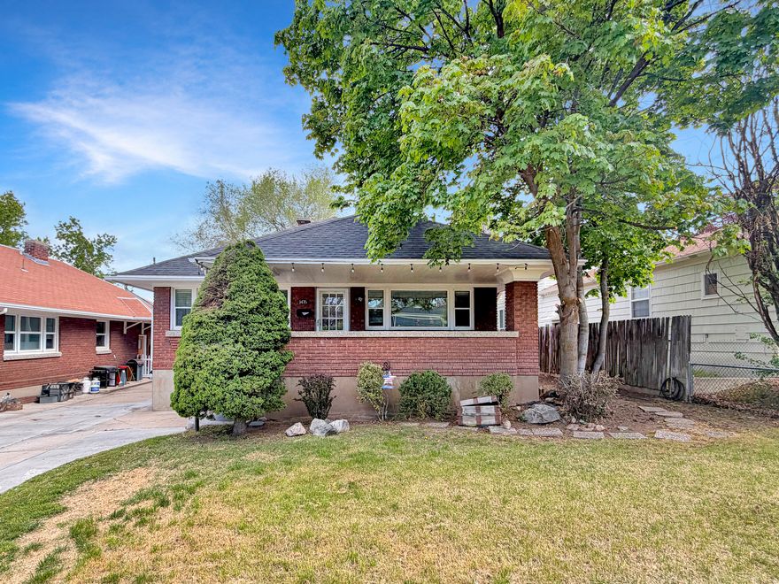 Rare opportunity on the highly sought-after Ogden East Bench! This 4-bedroom, 2-bath home with 2,304 sq ft is full of potential for investors or buyers looking to build equity in one of Ogden's most desirable locations. Inside, you'll find timeless character including original hardwood floors, a charming brick fireplace with lovely wood built-ins, and beautiful woodwork throughout the living and dining areas. Mountain views, a darling covered front porch, private backyard, and close proximity to the Bonneville Shoreline Trail system add to the appeal. Just minutes from restaurants, farmers markets, golf, and everything Ogden has to offer. Bring your vision and restore something truly special. Home sold as-is.