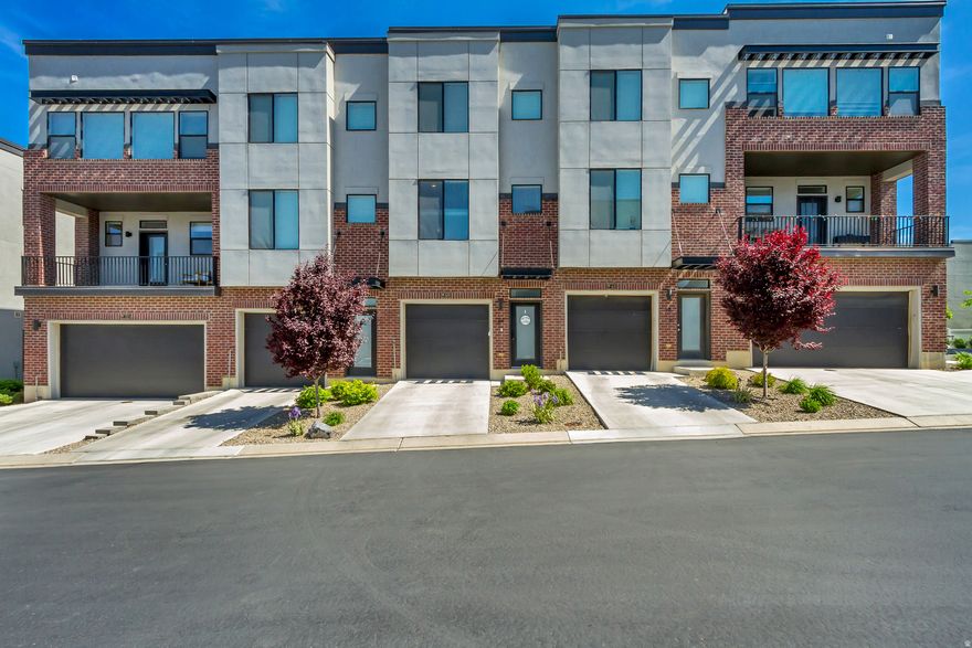 Ask about preferred lender's 1% rate buy-down special! Style is in abundance at this NSL Townhome! Modern design compliments the warm vibe of this home that has been exceptionally maintained to create the perfect space for entertaining, WFH, or collapsing on the couch to watch TV. The 2-car, tandem garage is extra deep for plenty of storage. Enjoy sunsets from the balcony and being 10-15 min from downtown. Location is key with quick access to I-15 and both SL and Davis Counties. Buyer and Buyer's agent to verify all to Buyer's satisfaction.