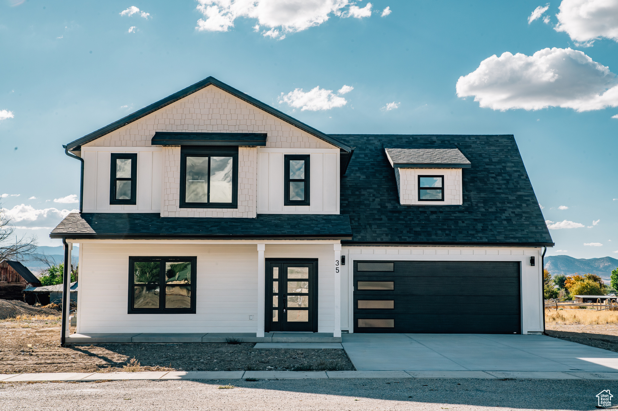 Stunning New Construction on Over Half an Acre! Discover comfort, craftsmanship, and space in this beautifully custom-built two-story home, perfectly situated on a generous .55-acre lot in new Danish Meadows Subdivision. With 2,536 sq ft of thoughtfully designed living space, this home blends modern luxury with everyday functionality. The main level (1,048 sq ft) welcomes you with a spacious open-concept layout, featuring a warm fireplace and custom built-ins in the living room. The chef's kitchen boasts both granite and quartz countertops, custom cabinetry, and a convenient additional storage closet-perfect for keeping things organized. A dedicated mudroom entry from the large 2-car garage adds a practical touch and half bathroom. Upstairs (1,488 sq ft), you'll find 4 generously sized bedrooms and 2 beautifully appointed bathrooms, including a luxurious master suite with a soaker tub, oversized walk-in closet, and spa-like bathroom. Enjoy quiet mornings on the covered front porch and entertain with ease on the back patio overlooking your spacious lot. High-end upgrades are found throughout, making this home a true standout. Don't miss your chance to own this one-of-a-kind home with custom finishes, room to grow, and space to breathe. ** Open house on Saturday October 4th 12-2 pm. **