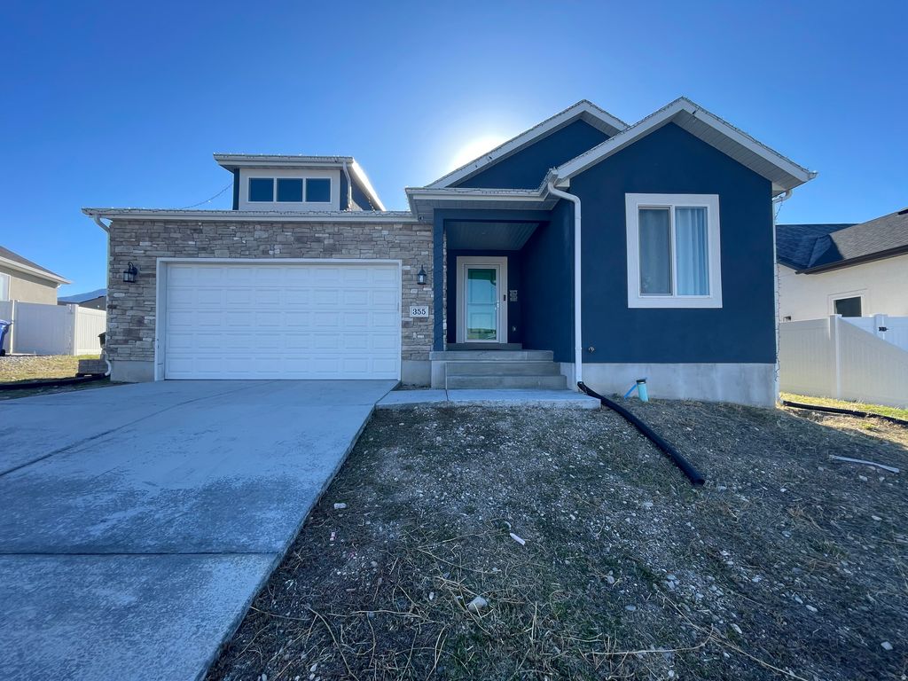 Photo of 355 W LAUREN LN N #214, Tooele, UT 84074 (MLS # 2128112)