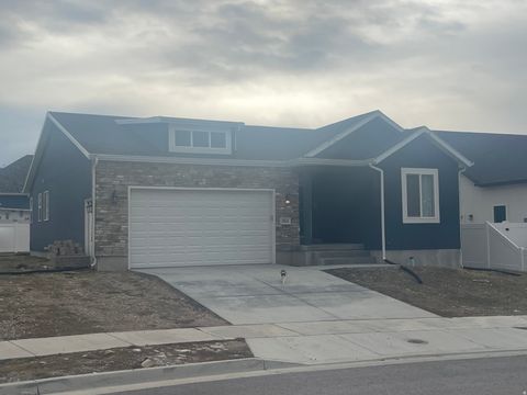 Photo of 355 W LAUREN LN N #214, Tooele, UT 84074 (MLS # 2128112)