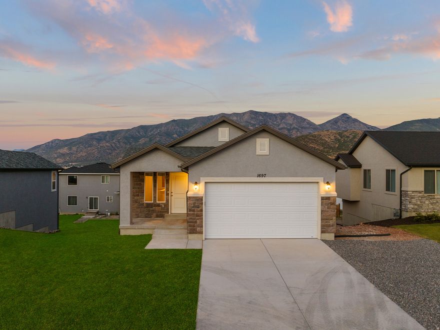 The "Logan" is an incredible floor plan in a beautiful neighborhood with stunning mountain views in The Hills community. We can complete this home in approximately 6 months and build this model on most available lots in the community. $10K in closing costs available with the builder's preferred lender. Rates, home, and lot details are subject to change. Call or text today for more information on this home or any of the 30+ floor plans we can build in this one-of-a-kind Santaquin community.