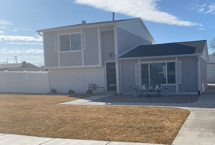 Gem of WVC!   Come see for yourself!  Vaulted ceilings, spacious kitchen, family, and roominess everywhere.  Finished basement adds even more living space with additional bedroom, half bathroom, and flexible areas ideal for a playroom, home office, gym, and family room with wood fireplace. On a large corner lot, the property offers wide driveway, beautiful curb appeal, and a large open backyard with patio and plenty of playground.  RV parking 77' x 16' through 20' gate on west side.  Oversize 2-car garage with more parking on 80' of driveway. Enjoy quiet mornings and evenings with scenic views right from your own yard. Located minutes from schools, parks, trails, and all the local amenities, this home offers the perfect blend of space, comfort, and convenience.  Updated everywhere, the Owner/Resident has installed new: 2020:  Water htr (gas) 2021: Roofing, gutters, windows,  2022:  concrete driveway/sidewalks,   and Furnace (gas), Stove (elec) 2023:  Garage redo: roofing and electrical    2024:  Vinyl fencing 6ft 2025: Sod and lawn watering system  Cameras/Security system with digital-code door locks