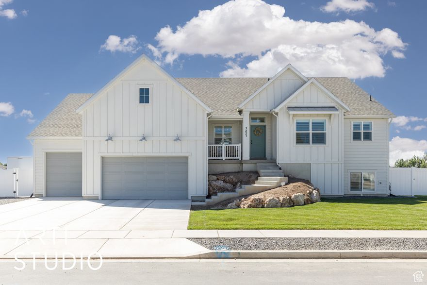 BIG PRICE REDUCTION!!!!**Charming Farmhouse Rambler with Stunning Sunset Views** Discover the serenity of country living in this exquisite Farmhouse rambler, set on a spacious lot with no backyard neighbors! Vaulted ceilings in the great room, allow natural light to flood the space and create an inviting atmosphere. Step outside onto the covered back porch to enjoy the mountain views and beautiful sunset. A fully finished basement features a walkout and a rough-in for a future kitchenette, the possibilities are endless! This versatile space is perfect for entertaining, and it includes two large cold storage areas for all your seasonal essentials. 4-car garage, provides ample room for all your toys and storage needs. Yard is already landscaped and backyard is fenced! Enjoy this recently built home without the hassle of new construction! Schedule your private tour today and experience the exceptional lifestyle this home has to offer!