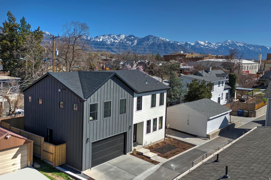 Indulge in this stunning new construction, perfectly positioned near the University of Utah Hospital and the vibrant 9th and 9th neighborhood. Perched on a generous lot in a peaceful cul-de-sac, this home offers a low-maintenance, fully fenced yard that's ideal for outdoor living. Inside, you'll find nearly 2,800 square feet of meticulously finished space, featuring five bedrooms and four baths. The open-concept design is bathed in natural light, with expansive windows that brighten every corner. Thoughtful upgrades throughout reflect the quality you expect in a new build, delivering modern comfort and style at every turn. Don't miss your opportunity to tour this exceptional home before it's spoken for.