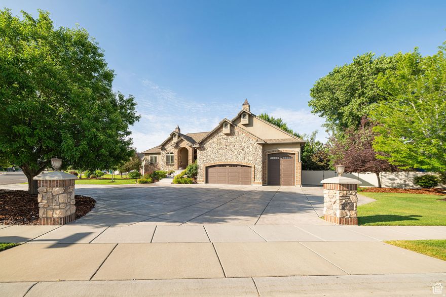 Experience luxury living at an affordable price.  This custom-built craftsman home was in the Parade of Homes.  With tall shiplap ceilings, high quality crown molded cabinets, high end finishes, transom windows, whole home audio, travertine floors and more.  It sits on a spacious corner lot with large mature trees, a beautiful deck off the upstairs and downstairs walkout, a large 4 car garage, pool table, RV pad, new water heather, new furnace and 40-year shingles, the list just keeps going.  Come take a look this Saturday January 24 from 10a-12p at our open house.    Square footage figures are provided as a courtesy estimate only and were obtained from county records.  Buyer is advised to obtain an independent measurement.