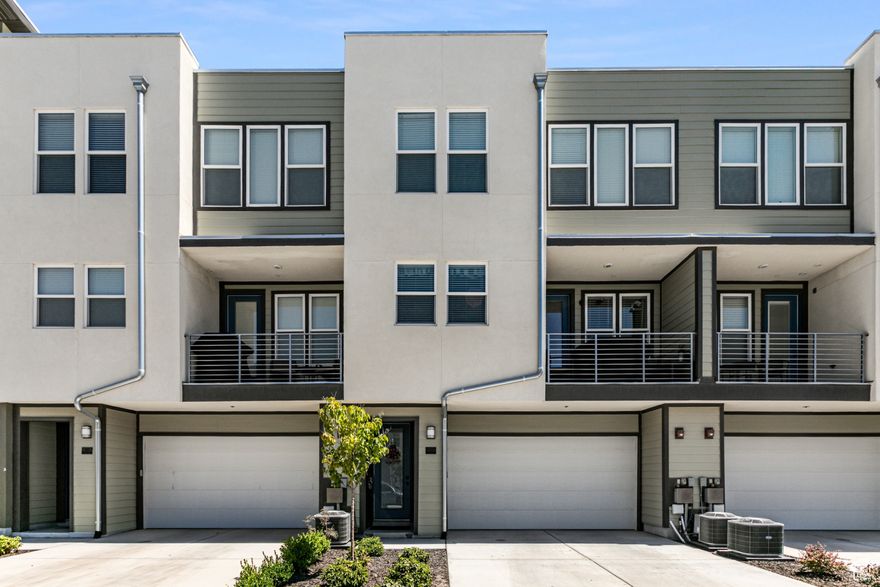 Contemporary design almost brand new townhome steps away from Station Park and Front Runner.  These beautiful Terrace StyleTownhome has large picture windows, a deck to enjoy indoor outdoor space, quartz countertops and designer lighting, and much more. Soon to come: a large retail gym across the street and an enormous public park connecting this project to the Farmington Trails system and pedestrian access to Station Park and Front Runner.  This 2 bed 2 bath unit is hard to find!   Buyer to verify all information in this MLS listing.