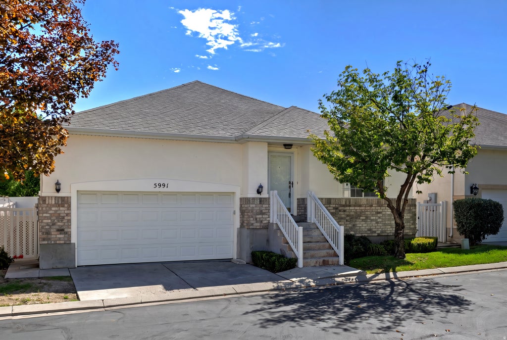 Photo of 5991 S ORIGIN PL, Taylorsville, UT 84123 (MLS # 2186243)