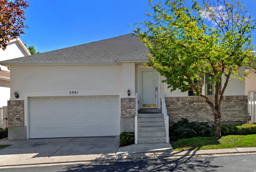 Photo of 5991 S ORIGIN PL, Taylorsville, UT 84123 (MLS # 2186243)