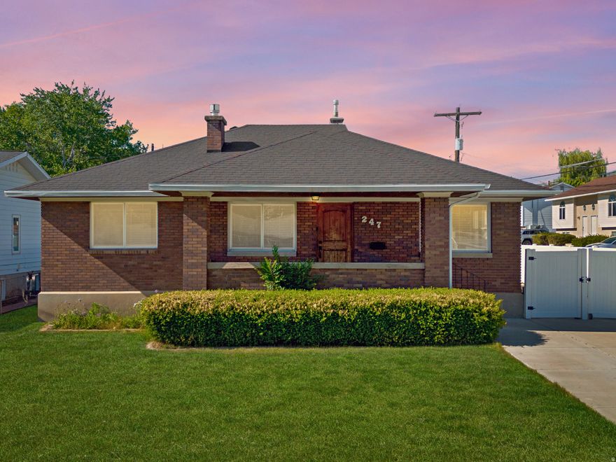 Now is your opportunity to own a charming all-brick bungalow in the heart of Kaysville. Ideally located within walking distance to schools and downtown Kaysville, with quick access to both the freeway and Highway 89, this home offers timeless character and modern functionality.  Step inside to an inviting floor plan designed for entertaining. The spacious family room features original hardwood floors and a cozy fireplace, creating the perfect place to gather. The updated kitchen offers abundant cabinetry and a large center island-an uncommon feature for homes of this era.  The main level includes three bedrooms and a beautifully preserved retro-style bathroom with vintage tile that adds distinctive charm. The basement provides excellent potential for future expansion and currently includes one finished bedroom, one bathroom, and ample storage, with room to add another bedroom and a large family room.  Enjoy outdoor living in the fully fenced backyard featuring a cement patio ideal for evenings around the fire pit, plus a detached garage and storage shed.  Major updates have already been completed, including the furnace and central air conditioning, roof, windows, electrical, water lines, and sewer line.  If you are looking for the charm of an older home but are not interested in the headache that comes with character, this one is for you!